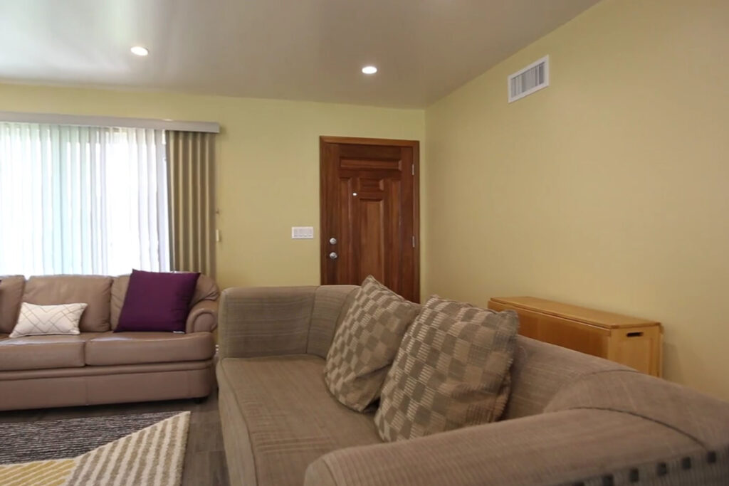 Living room seating area in the West Covina house project