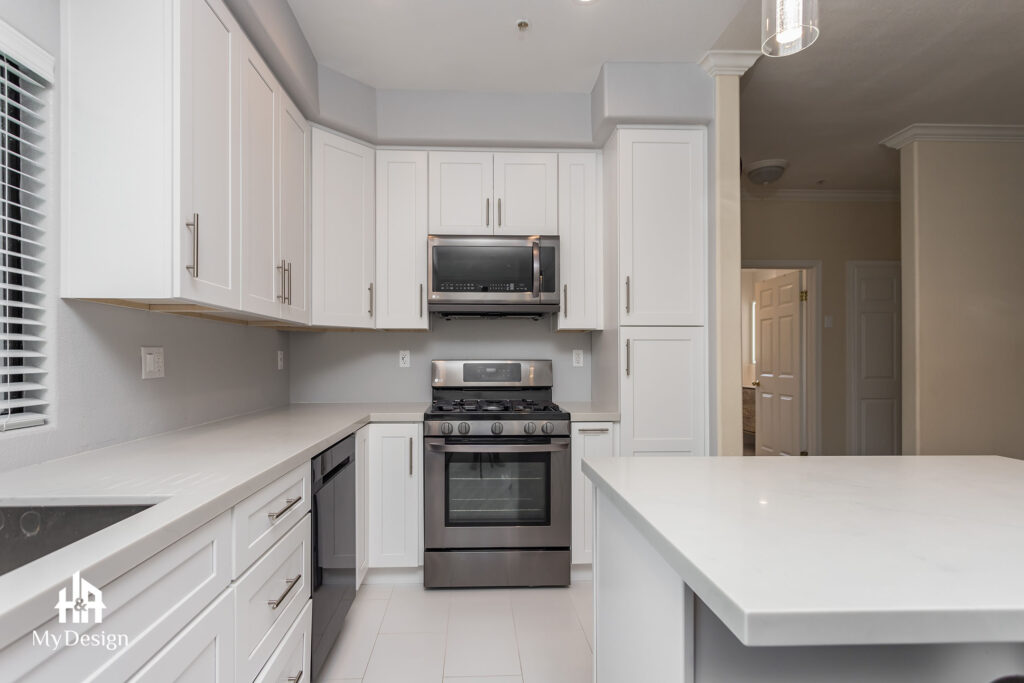 White kitchen with quartz counters in the Pasadena remodel