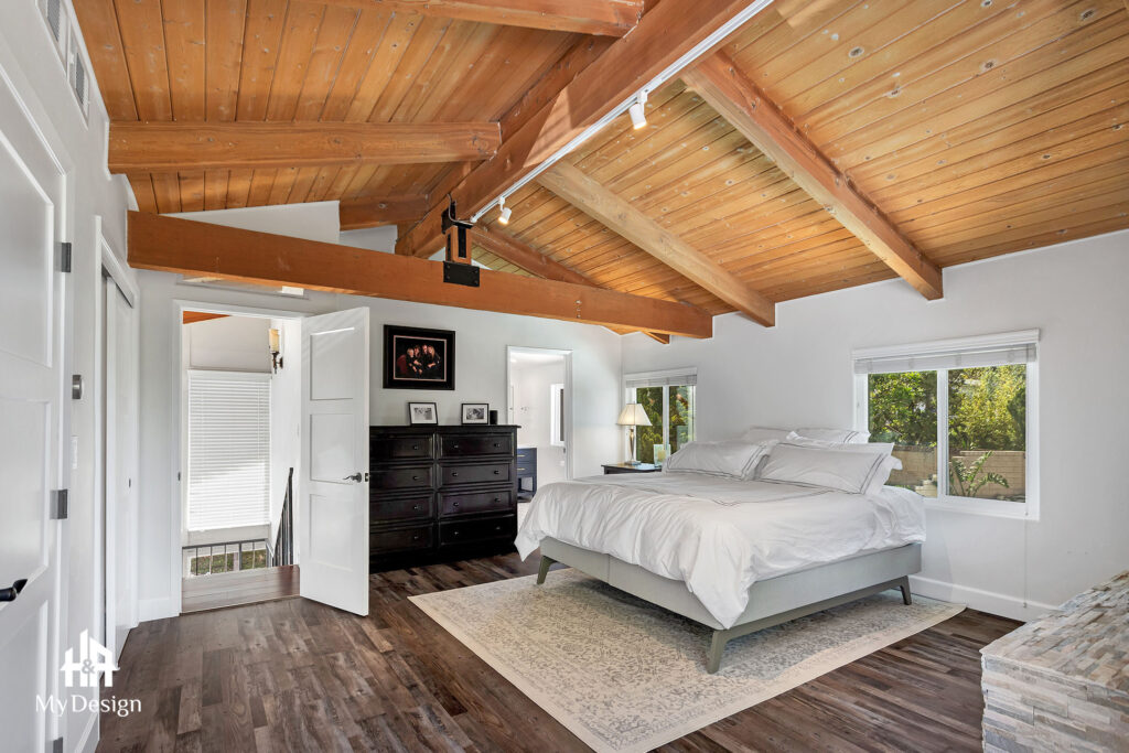 Primary bedroom with vaulted wood ceiling in the Northridge bedroom project