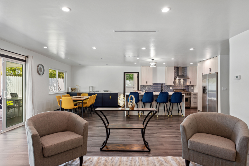 Open-plan living and dining room in a West Hills home construction project