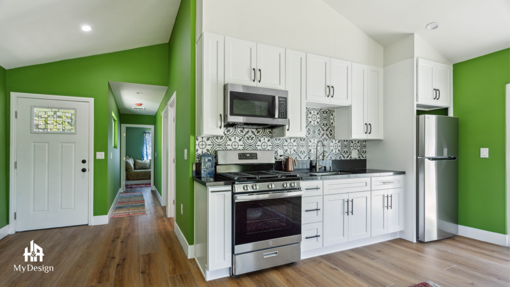 Kitchen with green accent wall in the Granada Hills ADU