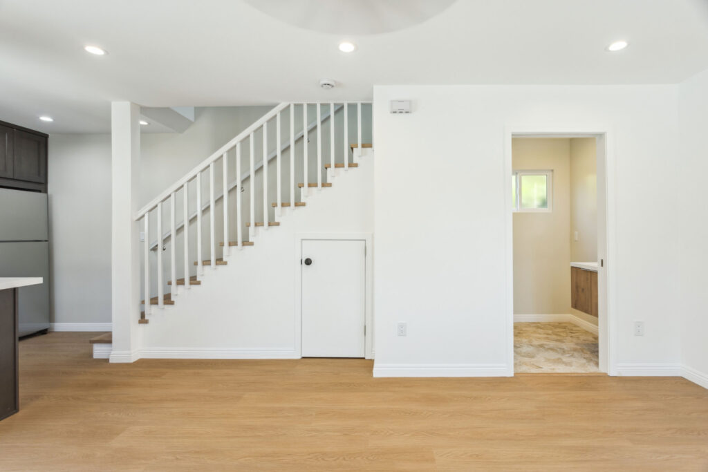 Ground-floor living area and staircase in the Culver City two-storey ADU