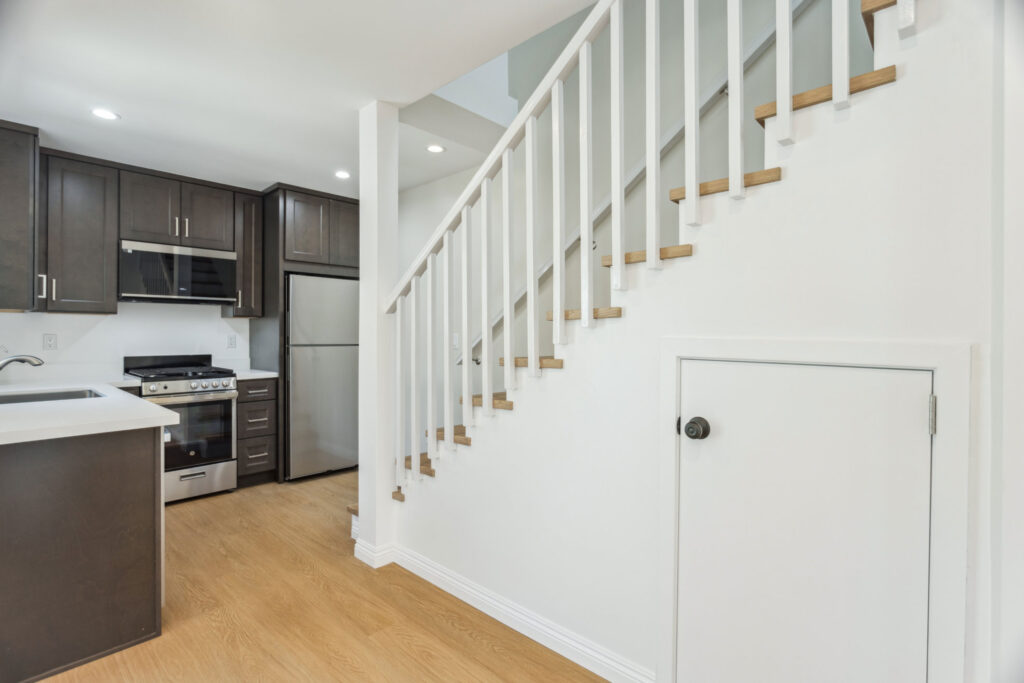 Staircase to the upper floor beside the kitchen in the Culver City ADU
