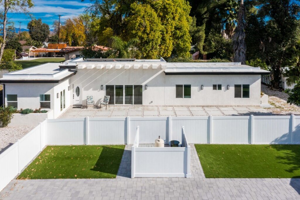 Aerial view of the completed white exterior at the Winnetka ADU project