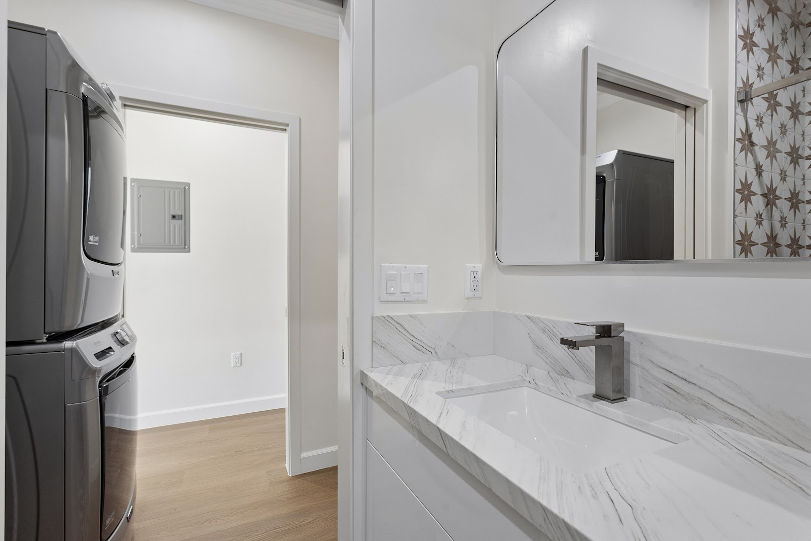 ADU bedroom with a window and built in closet