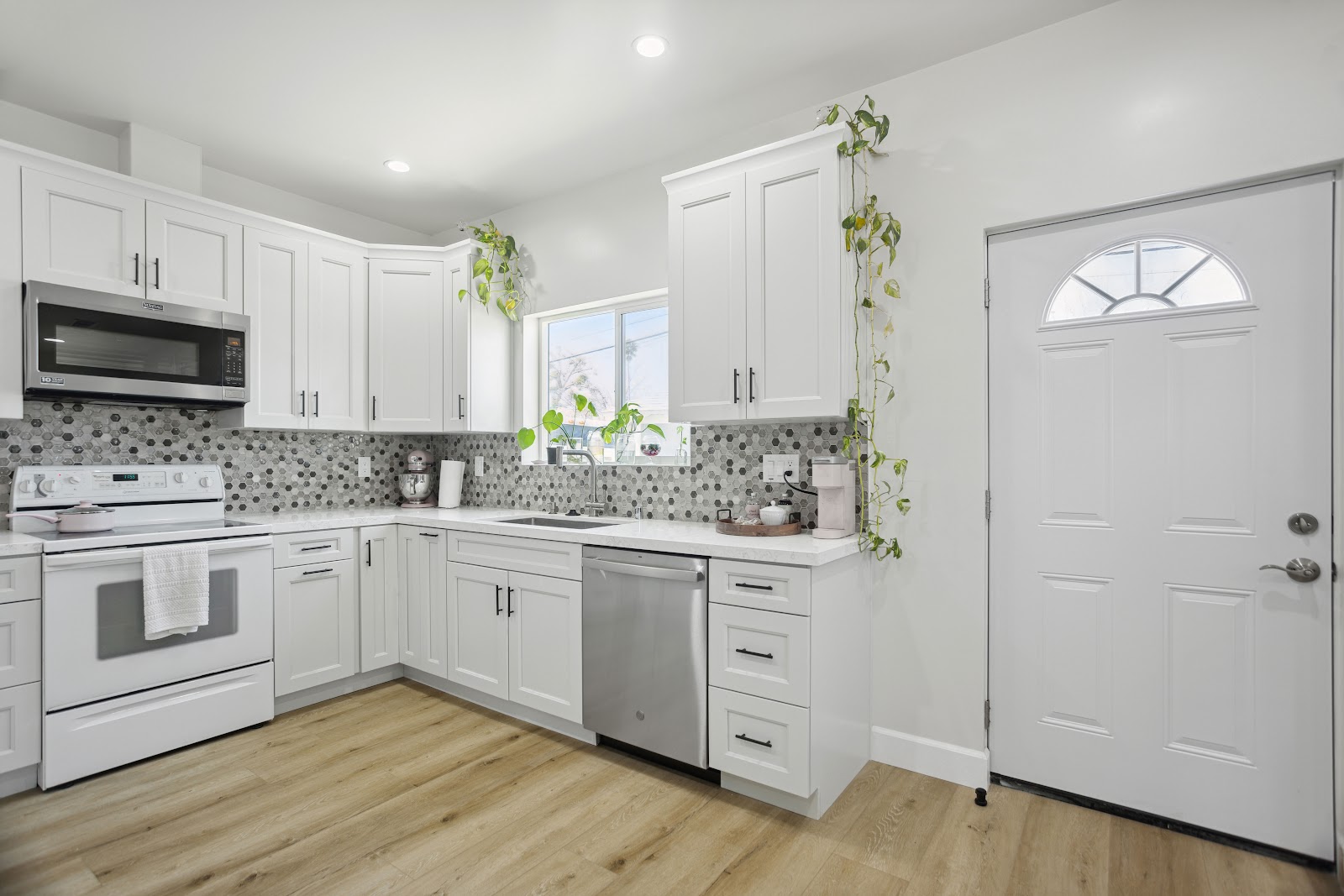 ADU kitchen fitted with full size appliances rather than compact units