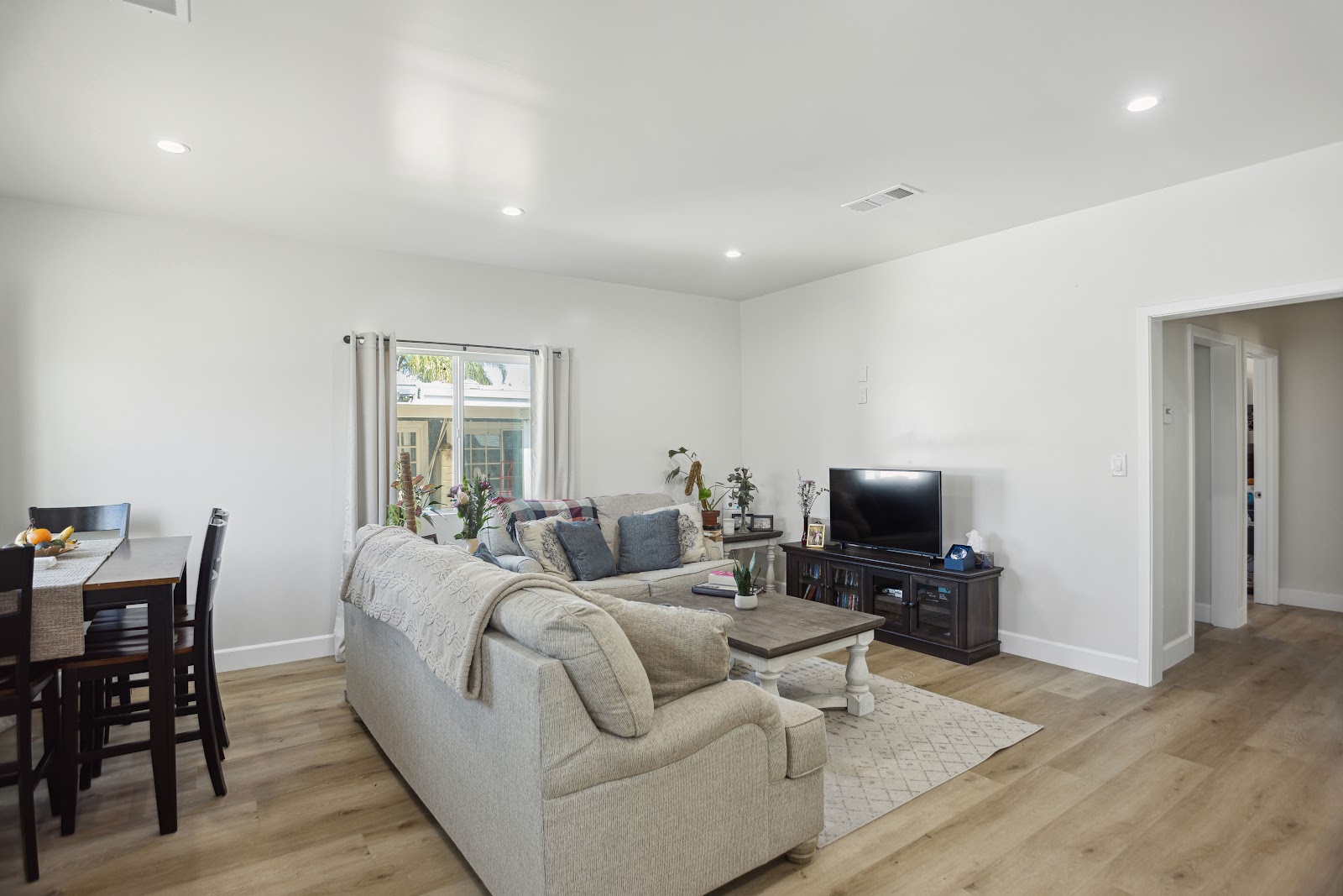 ADU living and dining area with vinyl plank flooring