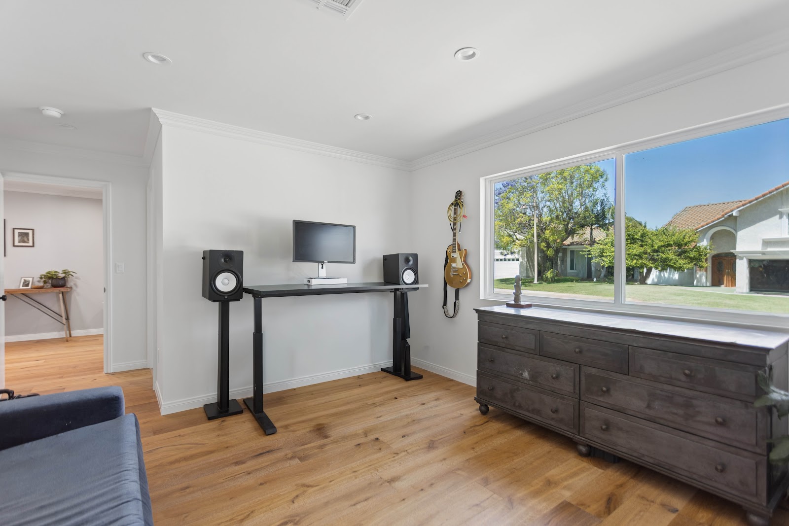 Quiet home office set up in a remodeled room away from the open plan