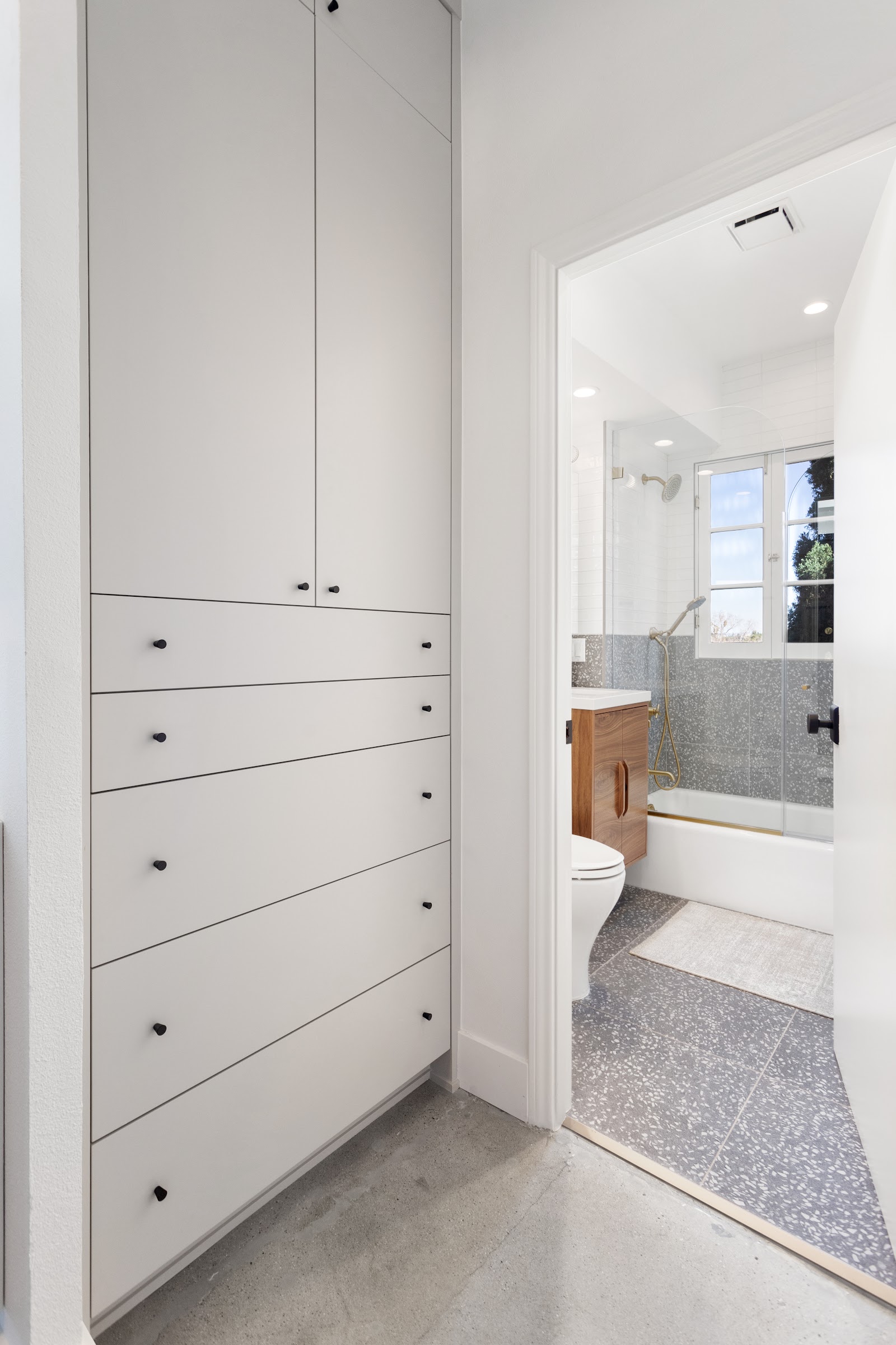 Styling detail against the marble backsplash in a home remodel