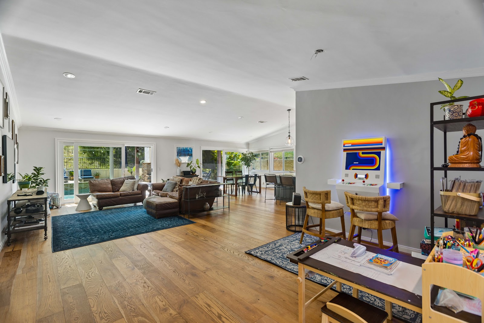 Open concept living space with a defined family and play area