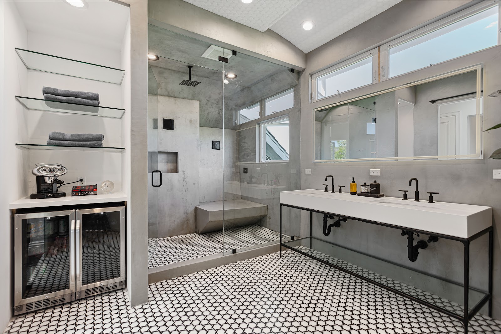 Wet room shower with a built in bench and ceiling rain head